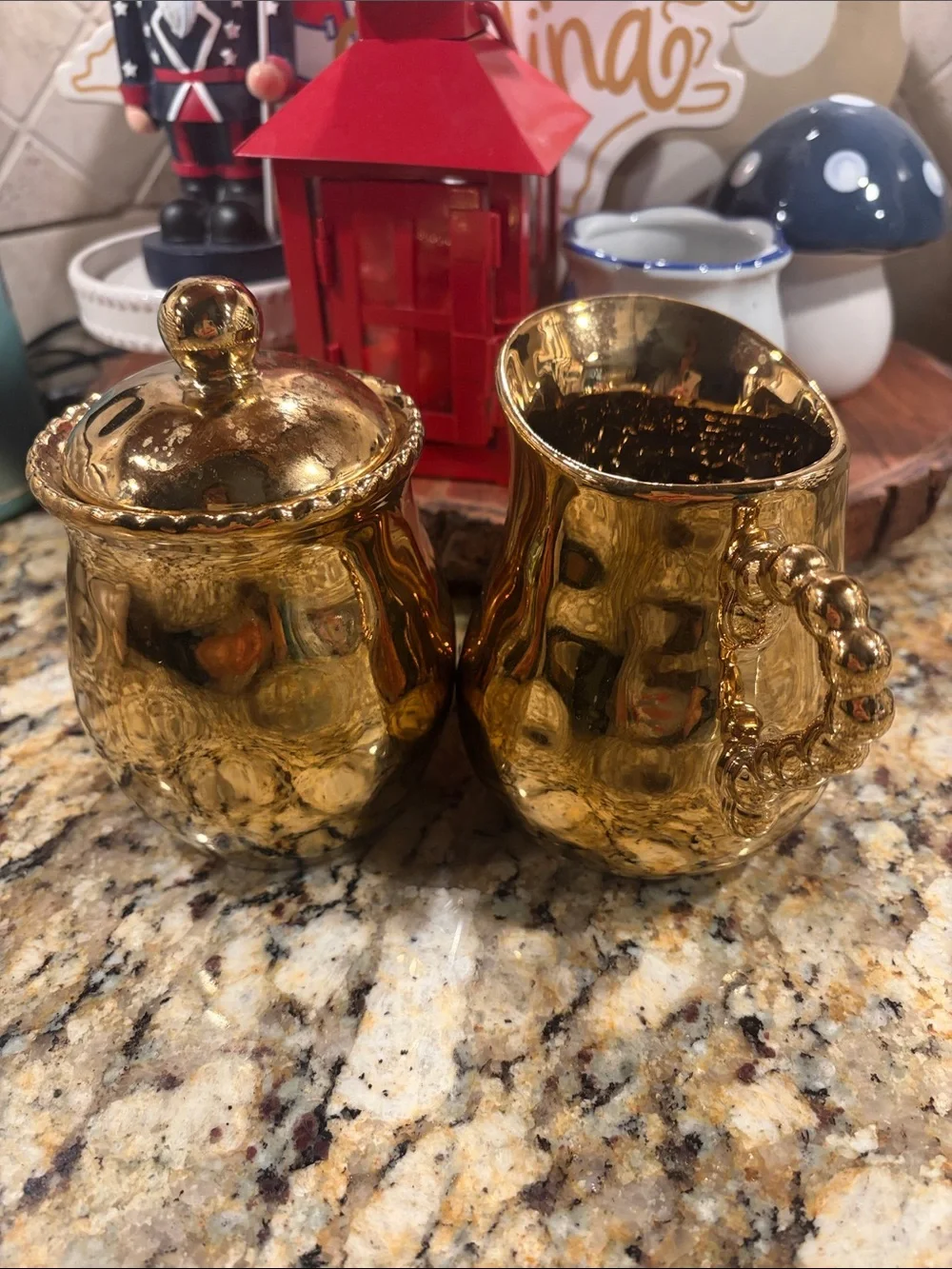 Gold Ceramic Creamer and Sugar Set with Beaded Details.
